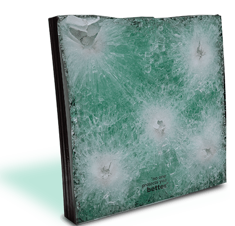 A thick glass panel with multiple visible impact points and cracks is shown, demonstrating resistance to penetration.