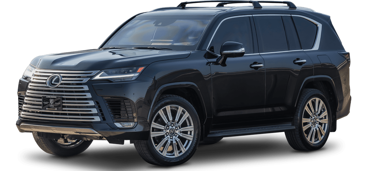 A black armored Lexus LX600 Ultra Luxury SUV with tinted windows, large front grille, and alloy wheels is parked.