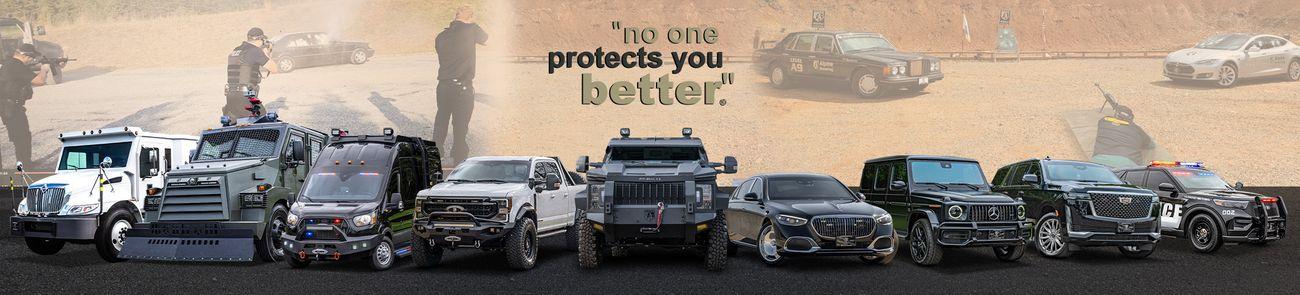 A row of armored vehicles is displayed in front of a backdrop showing a vehicle testing ground with people in the background. The banner reads "no one protects you better." The vehicles range from large trucks to sport utility vehicles (SUVs).